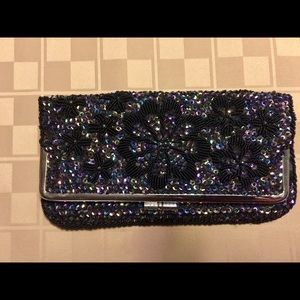 Hand beaded clutch